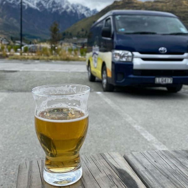a cup of beer on a table