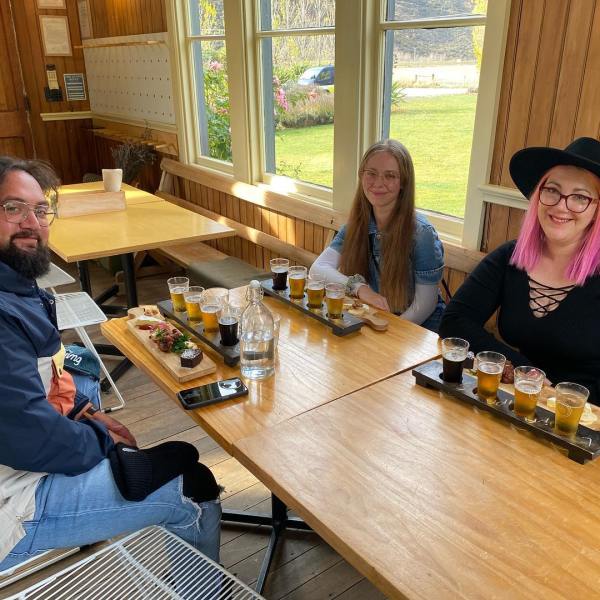 a group of people sitting at a table